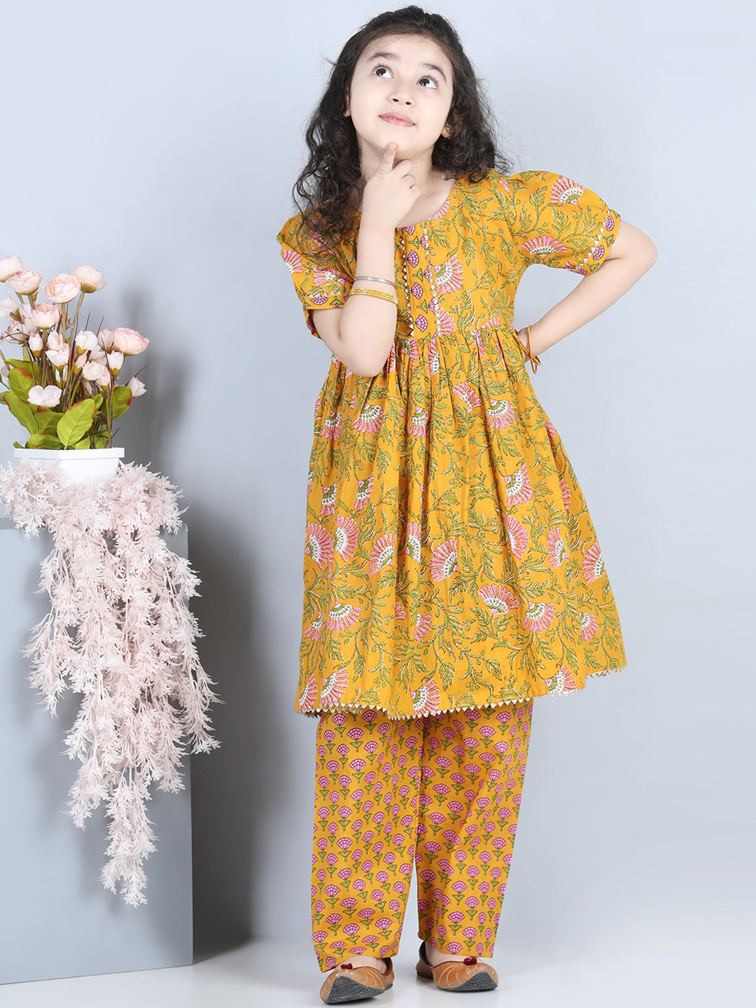 

ADIVA Girls Mustard Yellow Floral Printed Empire Kurta with Palazzos