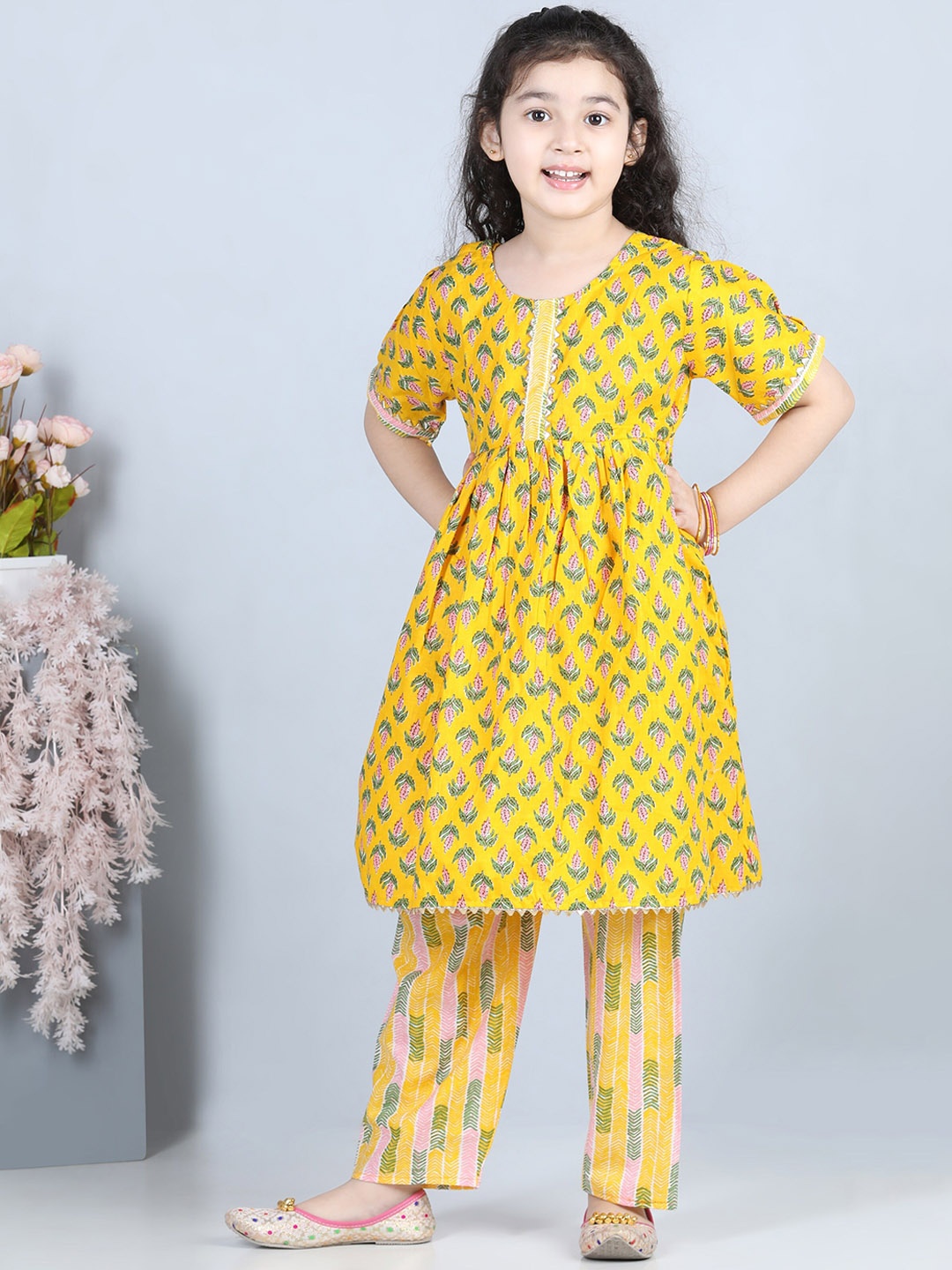 

ADIVA Girls Yellow Floral Printed Pleated Kurta with Palazzos