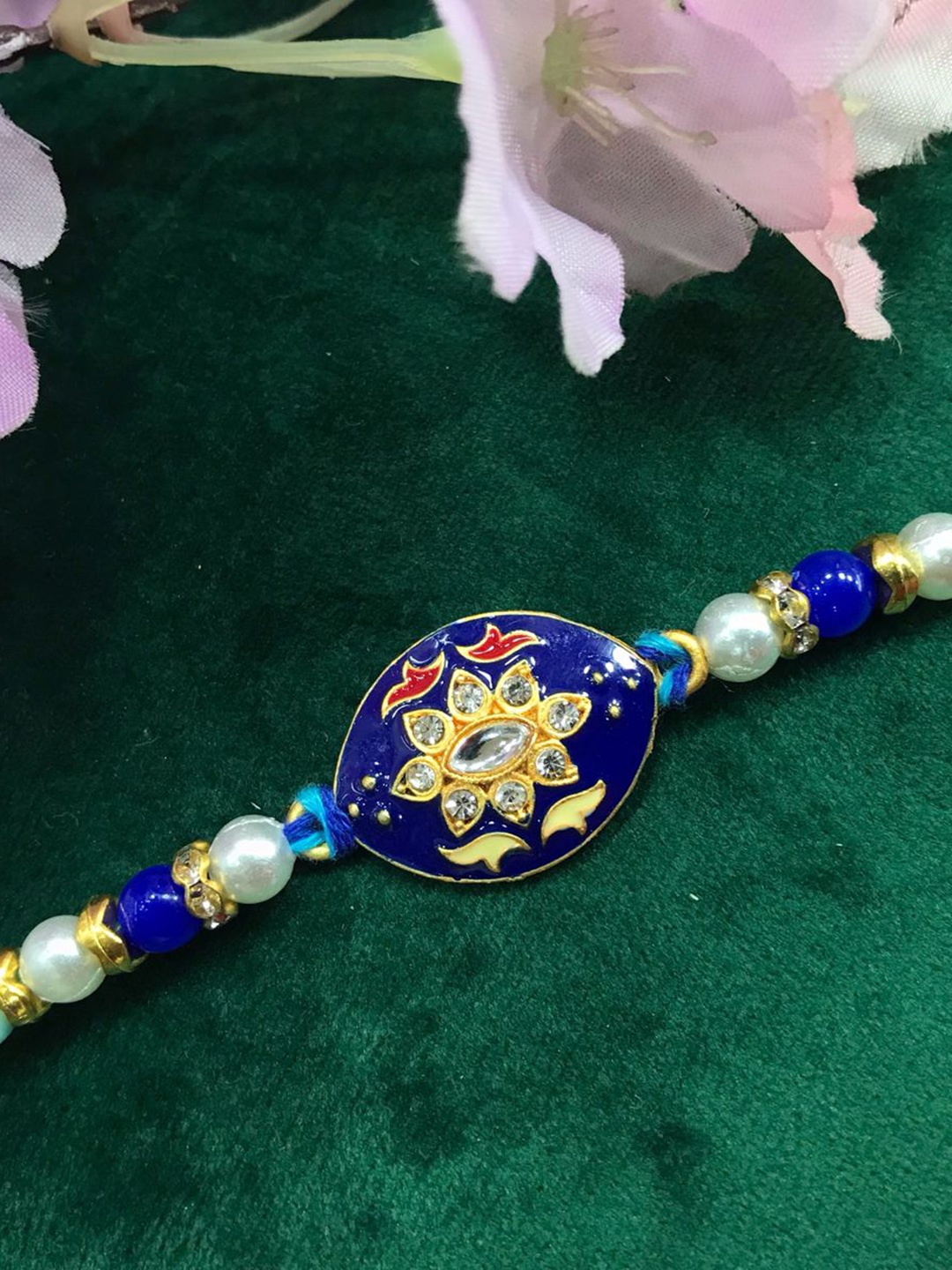 

MORKANTH JEWELLERY Men Blue & Gold-Toned Stone-Studded & Beaded Rakhi