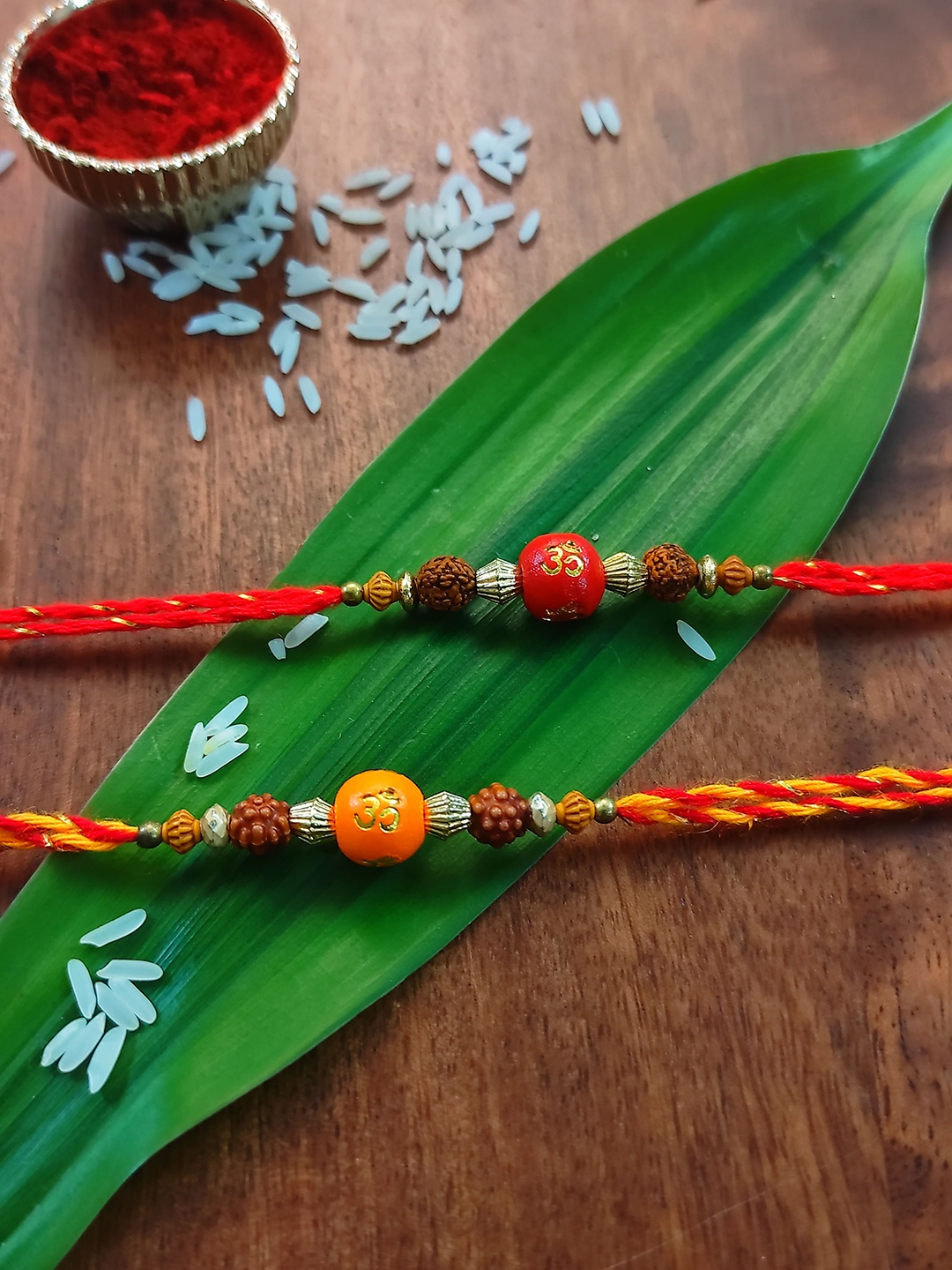 

CRAYTON Men Set Of 2 Red & Orange Designed Rakhi