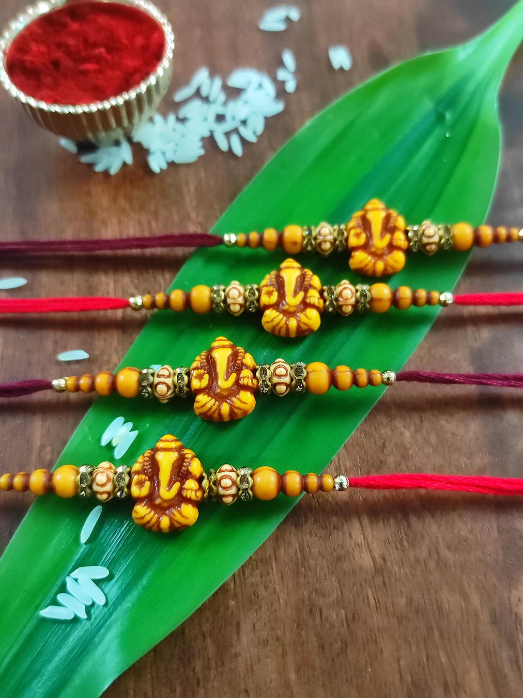 

CRAYTON Men Set Of 4 Gold-Toned White & Brown Stone-Studded & Beaded Rakhi