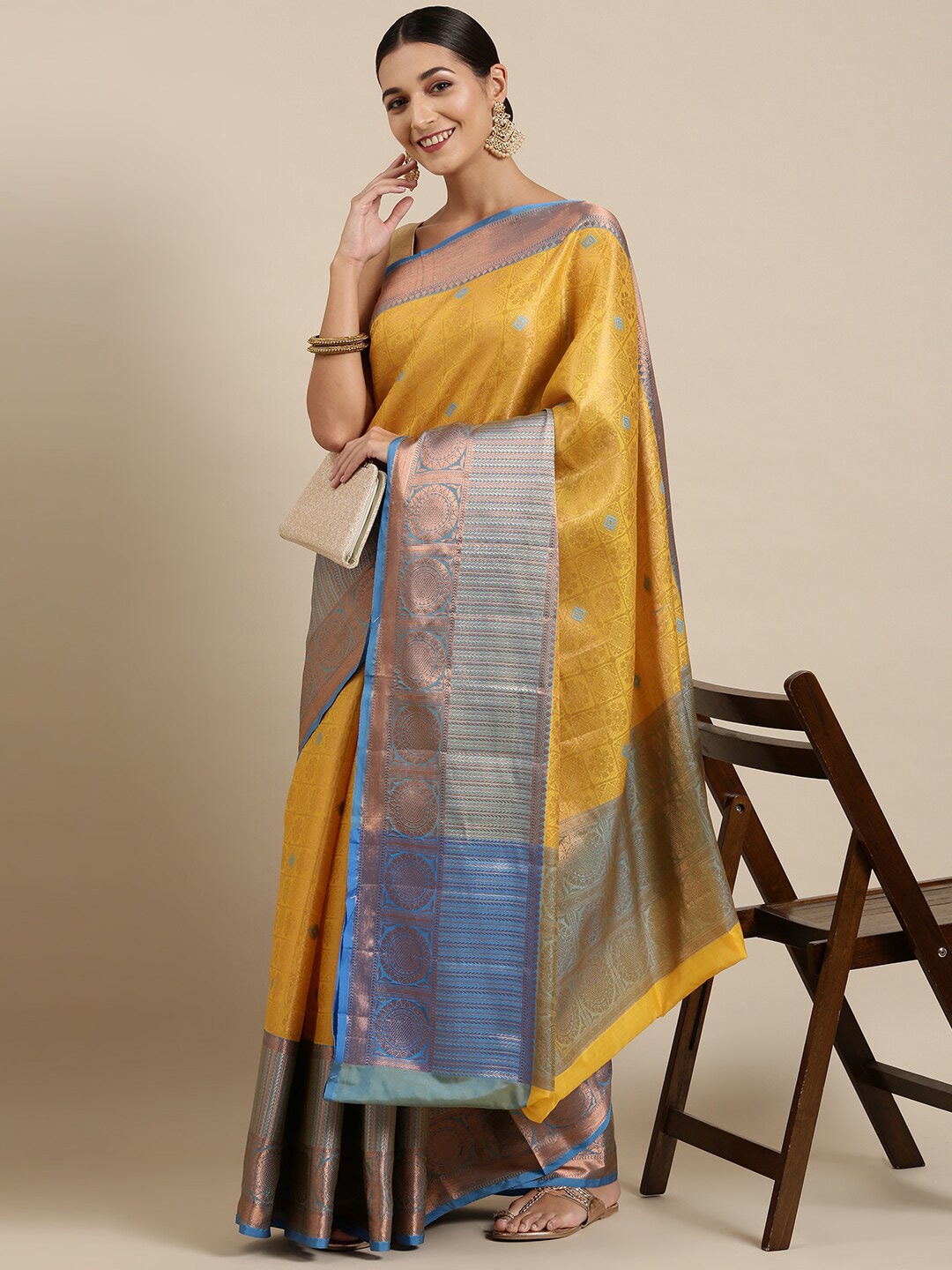 

The Chennai Silks Yellow & Blue Checked Zari Organza Fusion Banarasi Saree