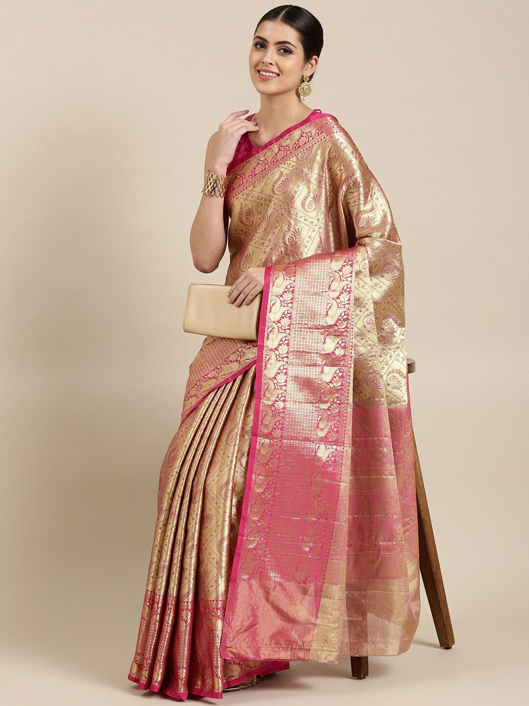 

The Chennai Silks Women Gold-Toned & Pink Woven Design Zari Organza Fusion Banarasi Saree