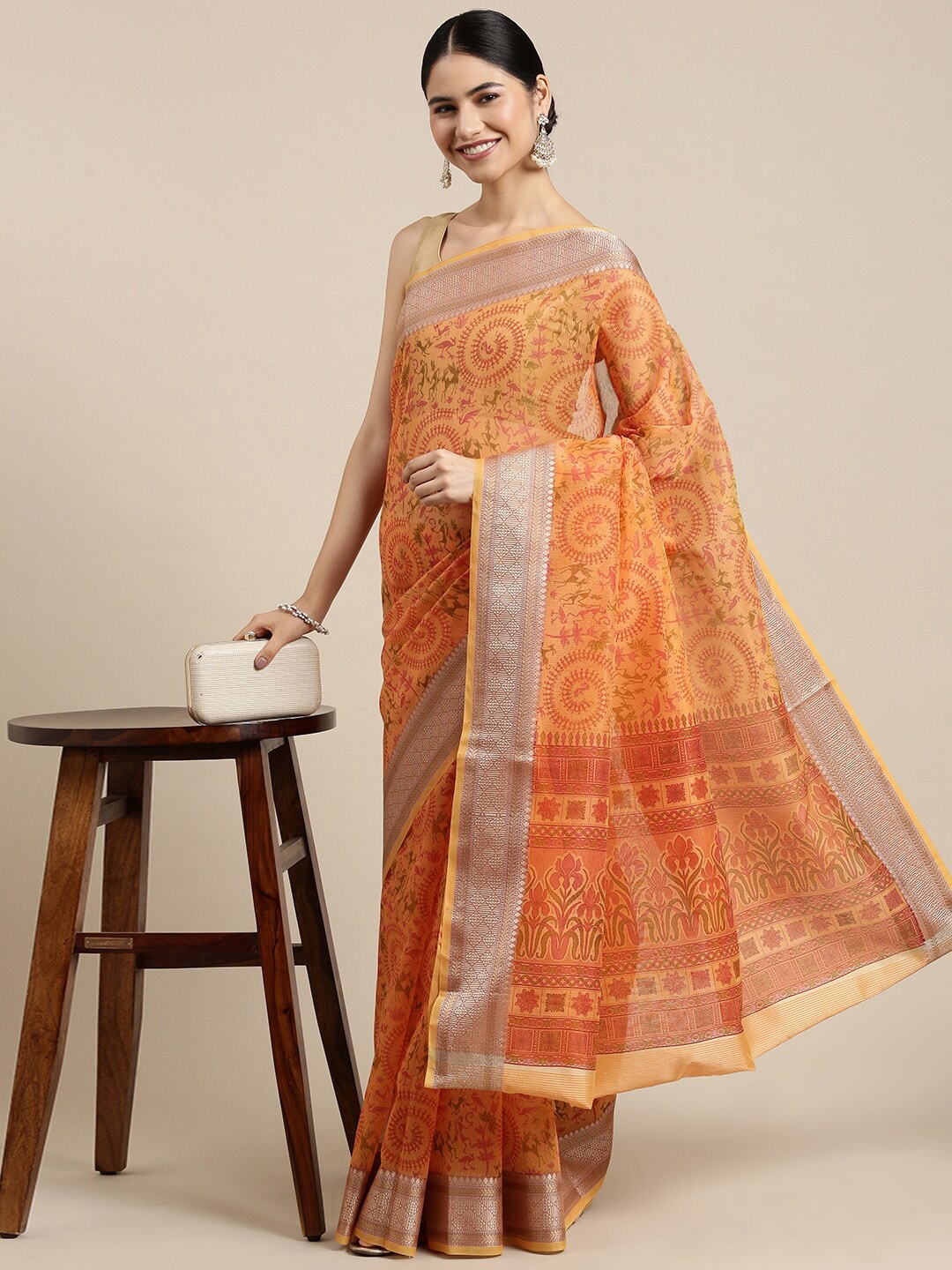 

The Chennai Silks Orange & Silver-Toned Warli Zari Supernet Fusion Kota Saree