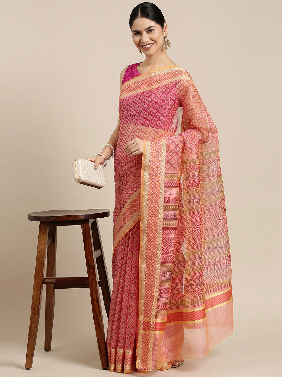 

The Chennai Silks Orange Supernet Fusion Kota Saree