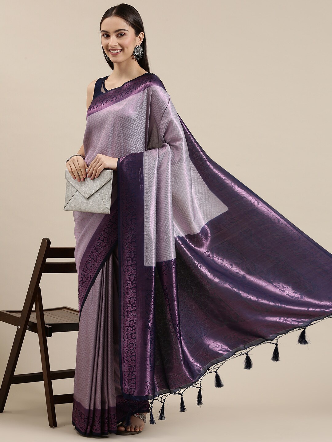 

The Chennai Silks Grey & Purple Ethnic Motifs Zari Art Silk Fusion Banarasi Saree