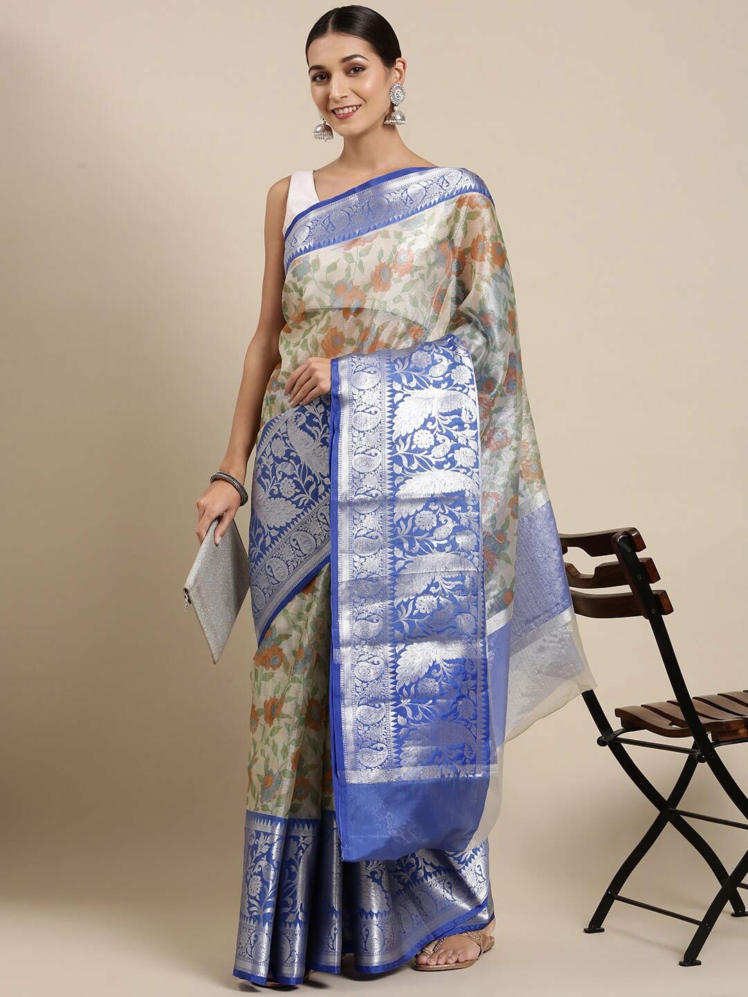 

The Chennai Silks Silver-Toned & Blue Floral Zari Organza Banarasi Saree
