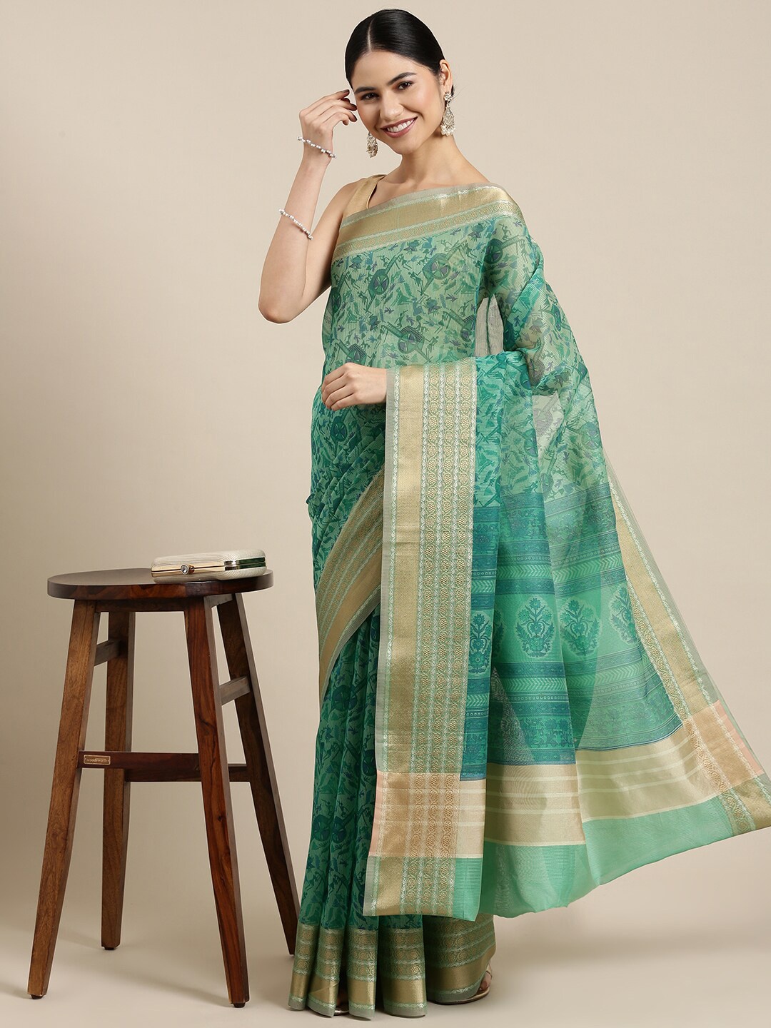 

The Chennai Silks Green & Brown Zari Supernet Fusion Kota Saree