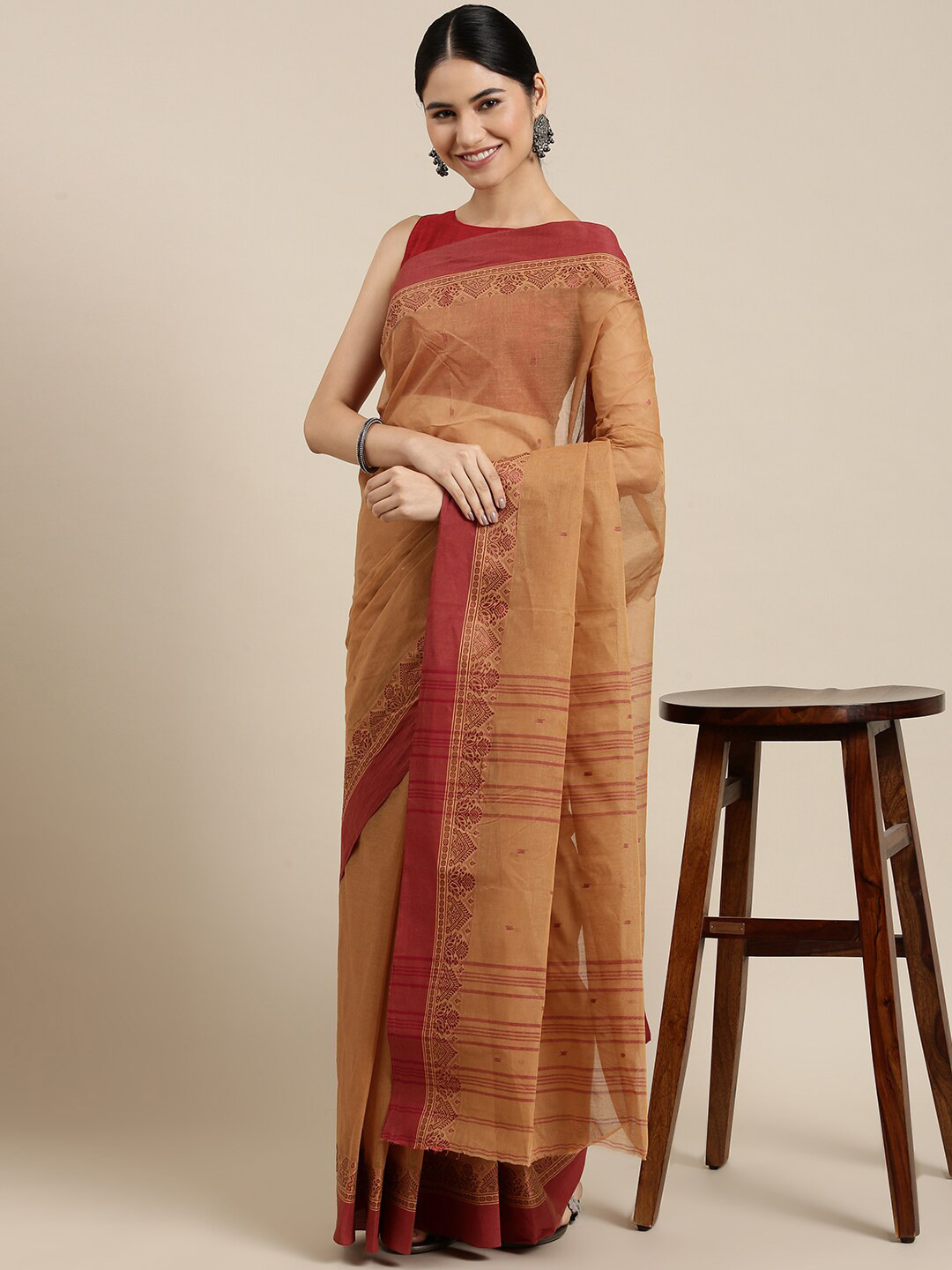 

The Chennai Silks Brown & Red Ethnic Motifs Pure Cotton Taant Saree