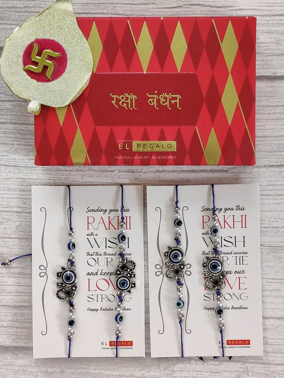 

EL REGALO Set Of 4 Blue & Silver Coloured Evil Eye Beaded Wraparound Rakhi