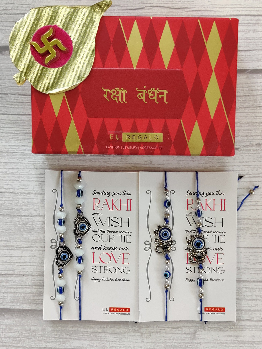

EL REGALO Set Of 4 Silver-Coloured & Blue Beaded Wraparound Rakhi