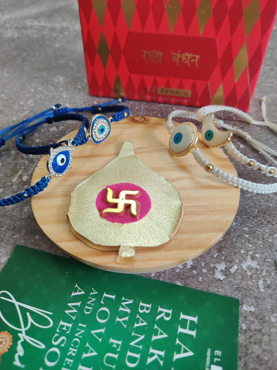 

EL REGALO Set Of 4 Blue & White Evil Eye Stone Studded Wrap Around Rakhi