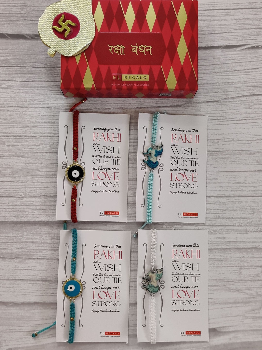 

EL REGALO Set Of 4 Red & Blue Wrap Around Rakhi With Roli Chawal & Raksha Bandhan Greeting Card