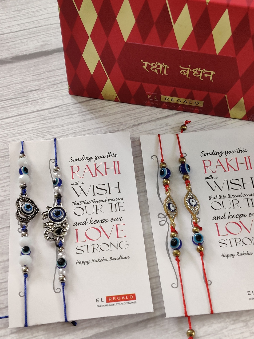 

EL REGALO Pack of 4 Blue & Red Evil-Eye Rakhi Gift Set