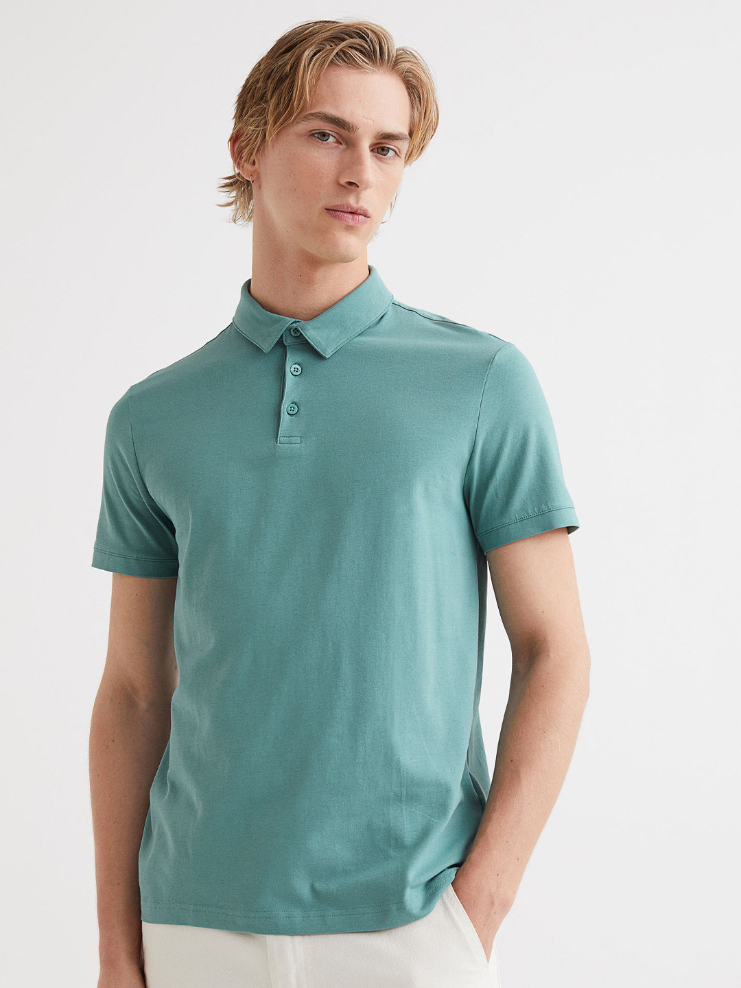 

H&M Men Turquoise Blue Solid Slim Fit Polo Shirt