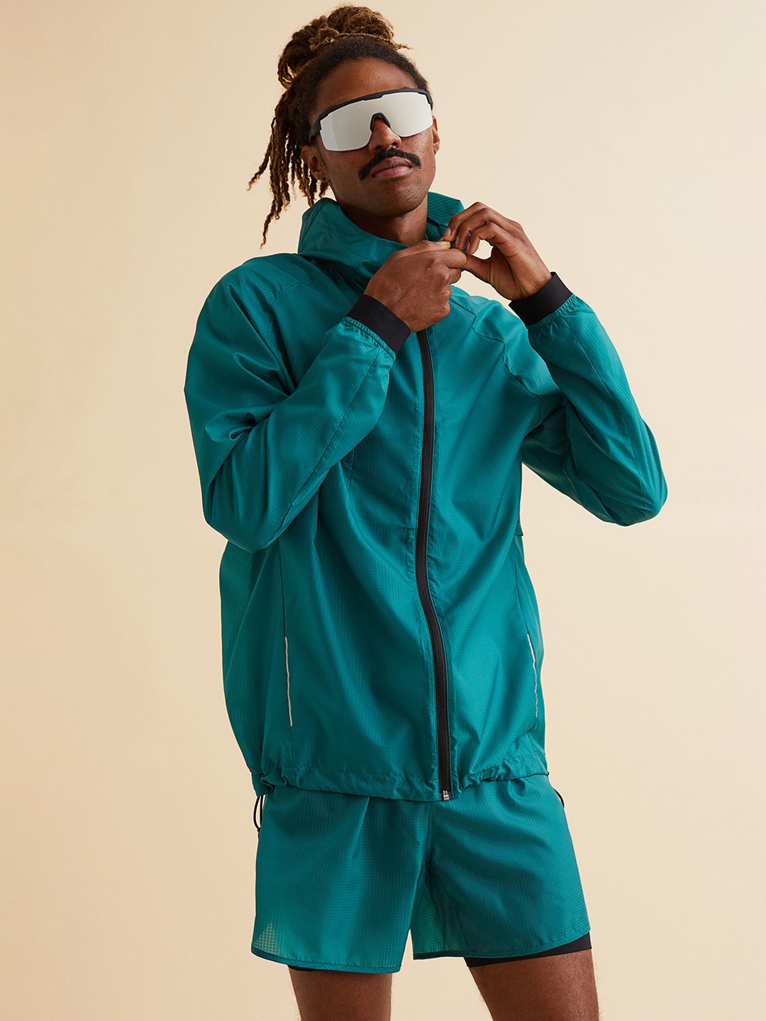 

H&M Men Turquoise Blue Water Resistant Sporty Jacket
