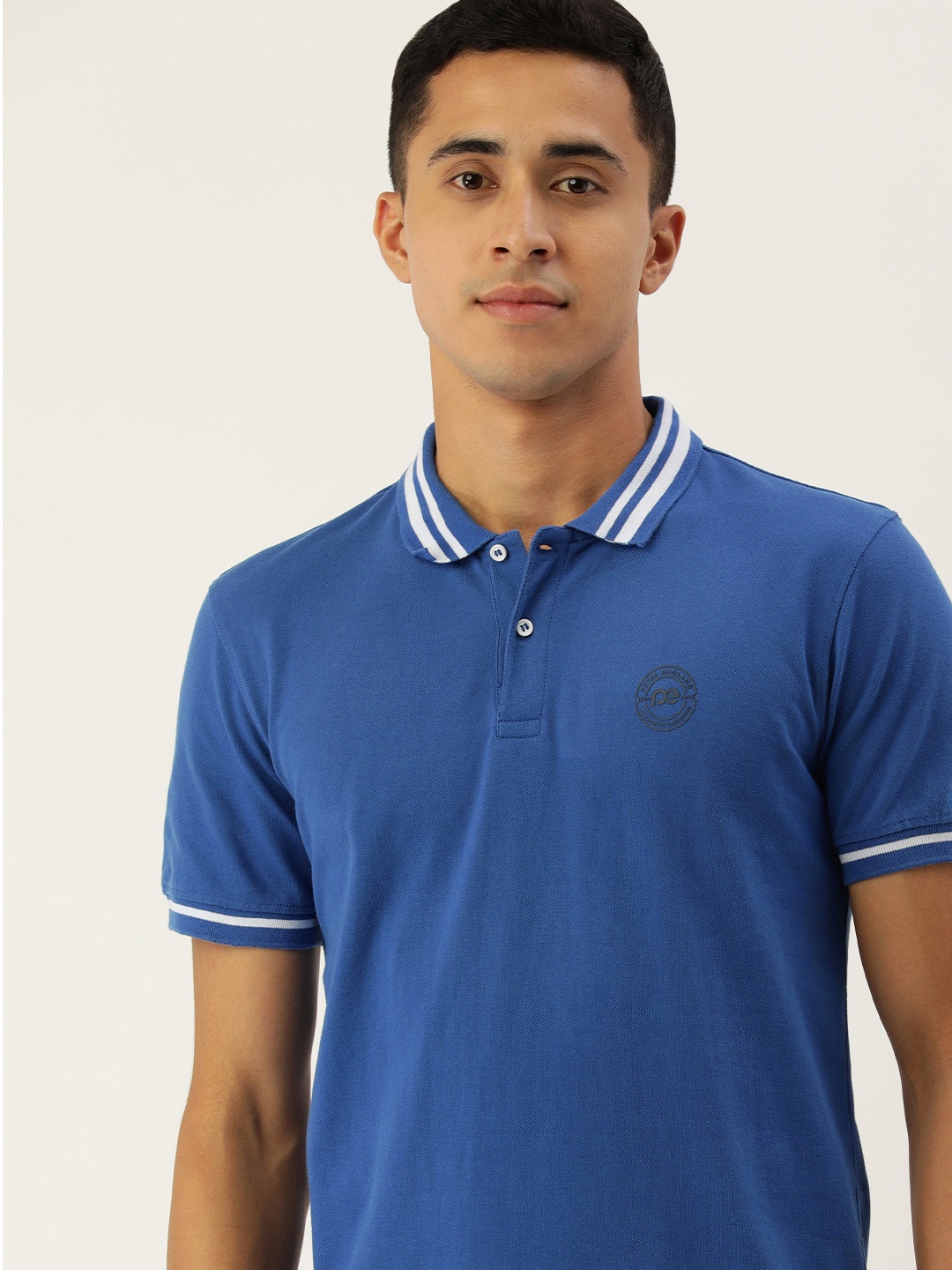 

Peter England Men Blue Polo Collar T-shirt