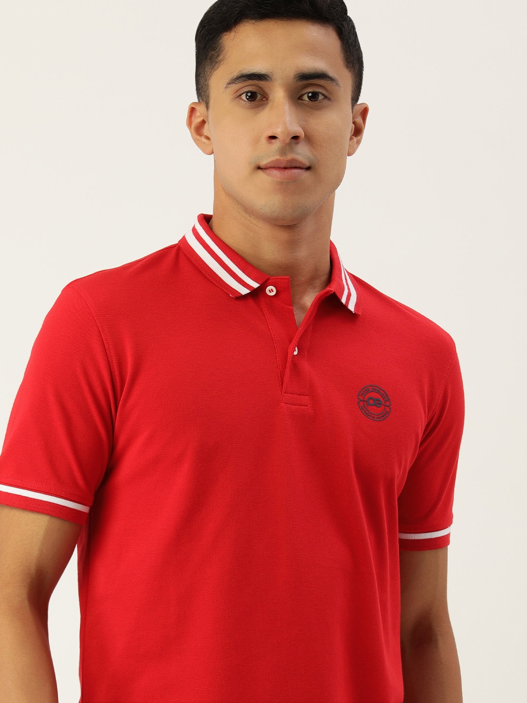 

Peter England Men Red Polo Collar T-shirt