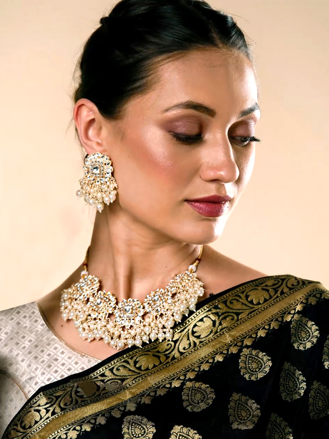 

Yellow Chimes Gold-Plated & White Pearl & Kundan-Studded Jewellery Set