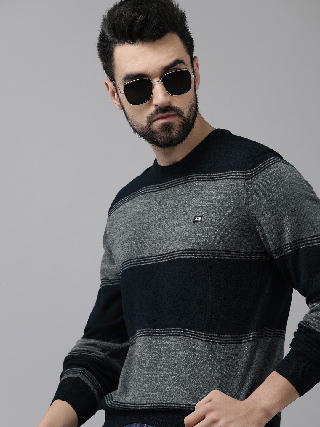 

Arrow Men Navy Blue & Grey Striped Pullover