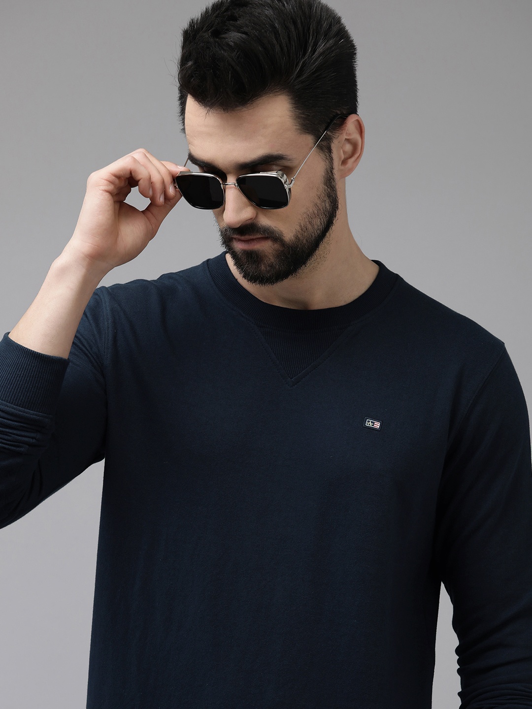 

Arrow Men Navy Blue Solid Knitted Sweatshirt