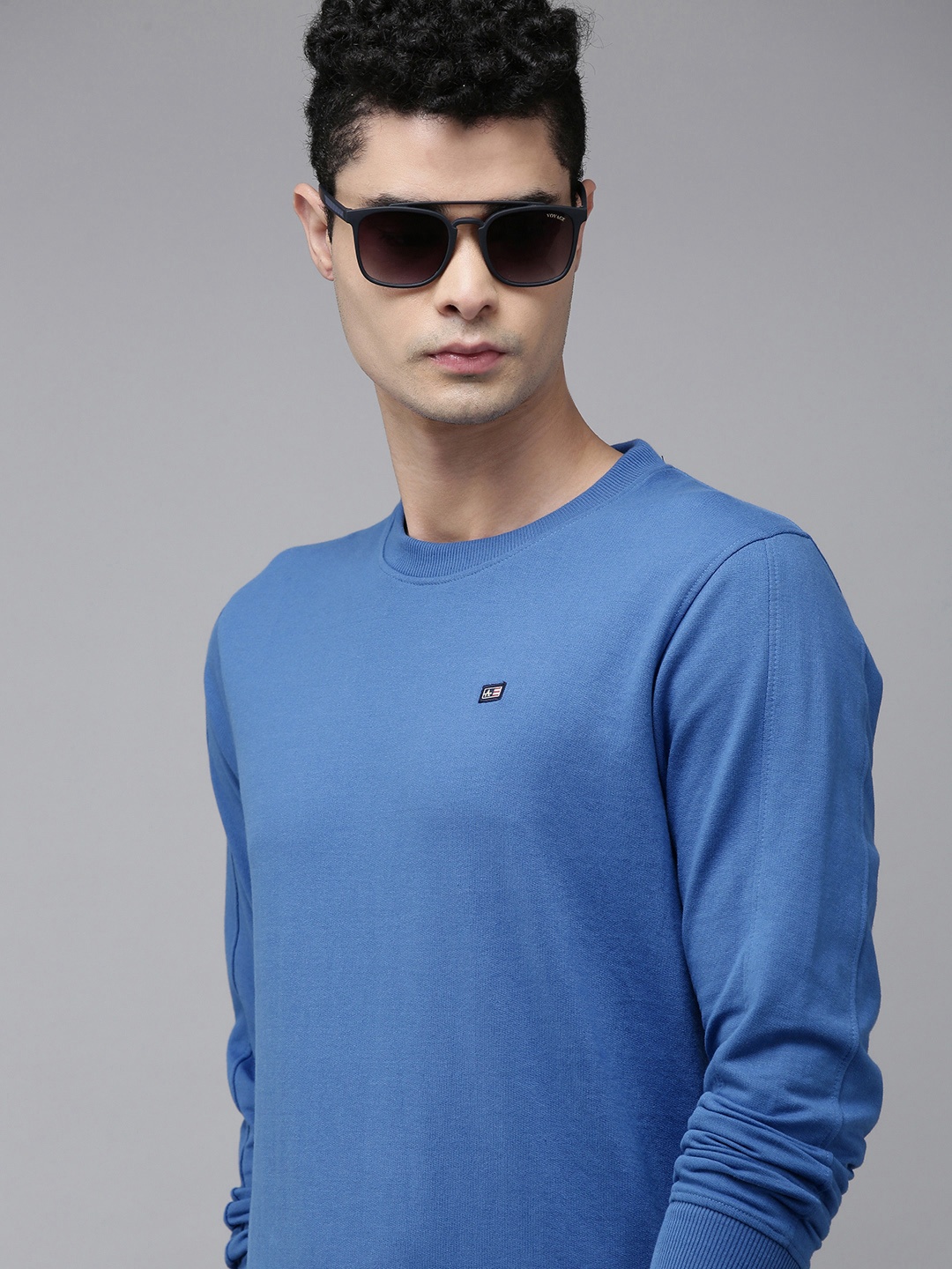 

Arrow Men Blue Solid Pullover Sweatshirt