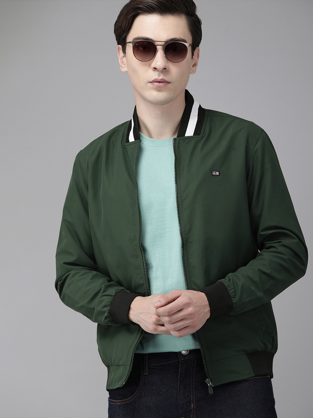 

Arrow Men Green Solid Collarless Bomber Jacket