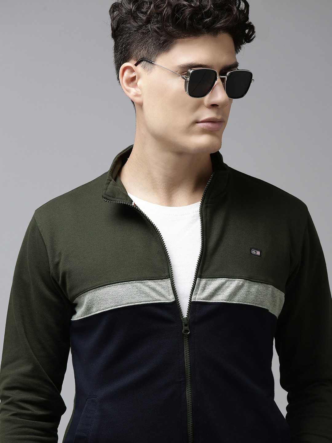 

Arrow Men Olive Green & Navy Blue Colourblocked Sweatshirt