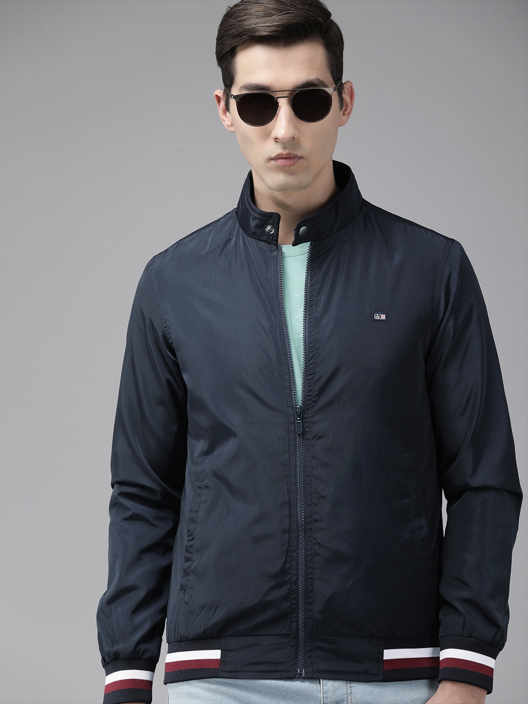 

Arrow Men Navy Blue Solid Bomber Jacket
