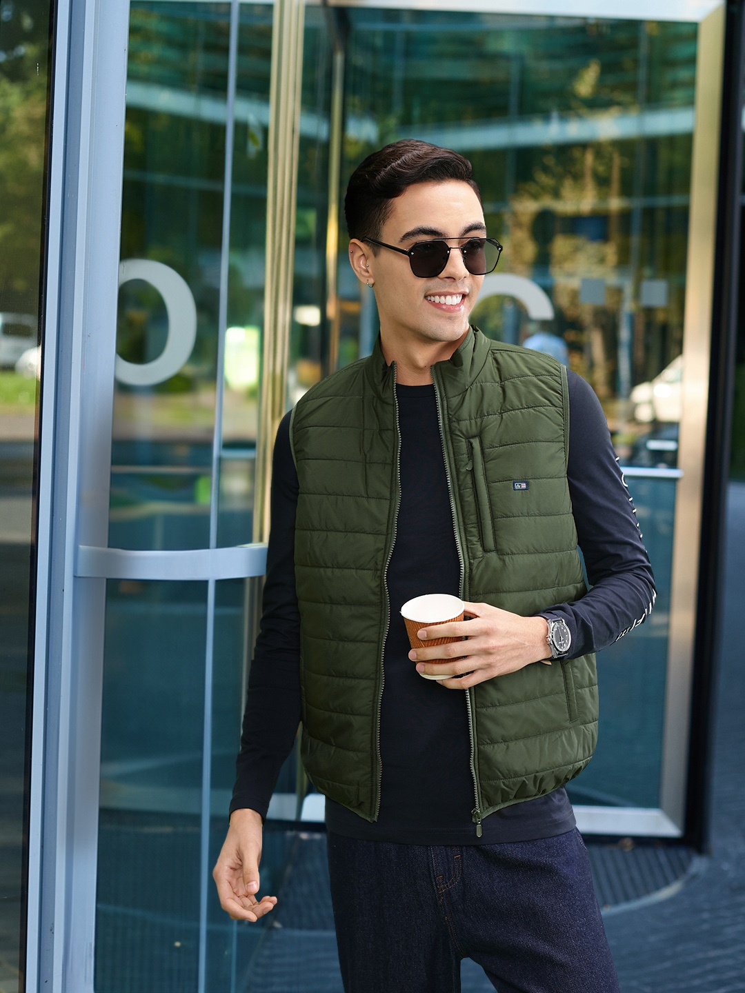 

Arrow Men Green Solid Sleeveless Padded Jacket