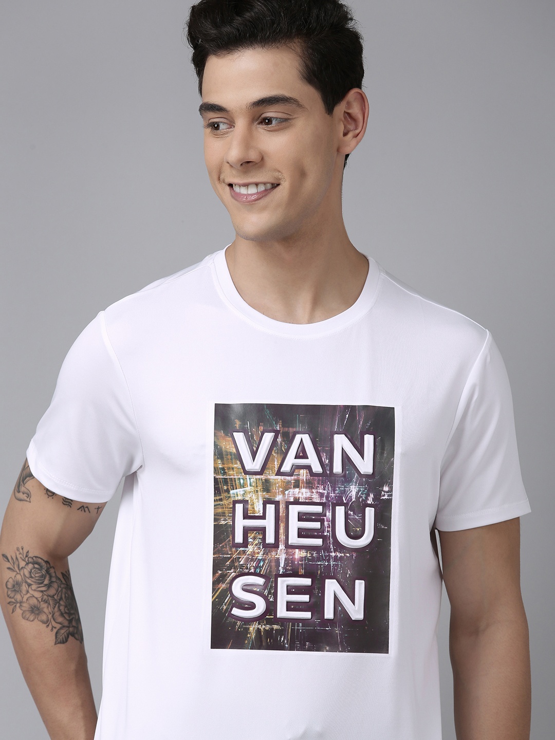 

Van Heusen Flex Men Running Typography Printed Slim Fit T-shirt, White