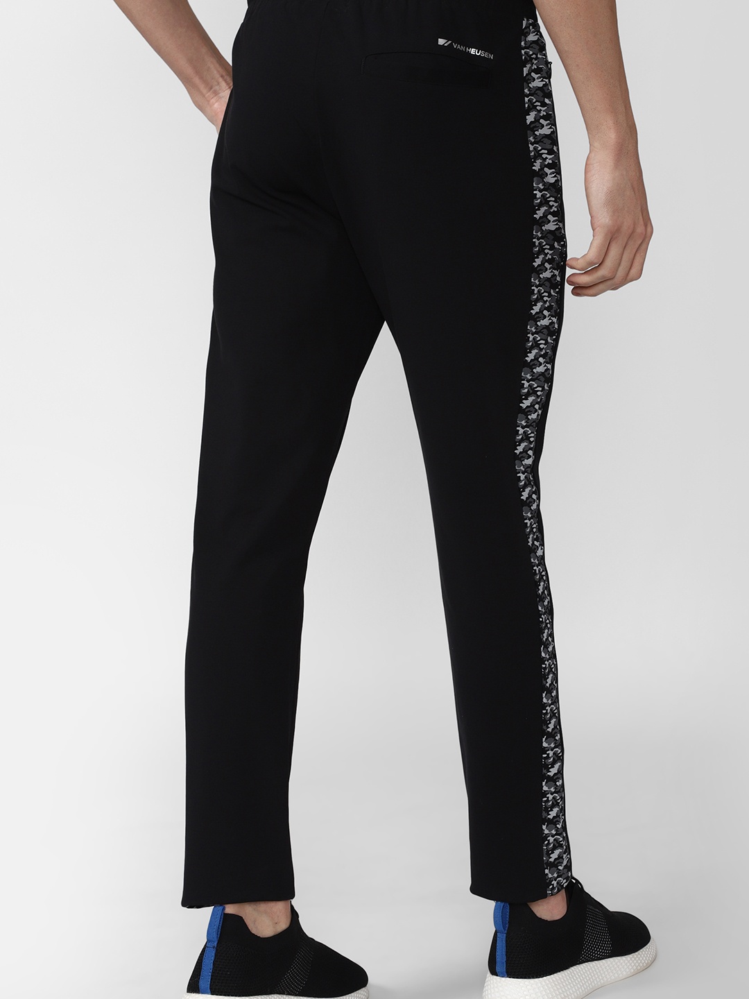 

Van Heusen Flex Men Black Solid Sports Track Pants