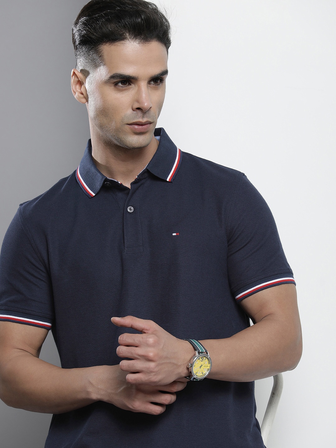 

Tommy Hilfiger Men Navy Blue Polo Collar Solid T-shirt With Brand Logo Detail