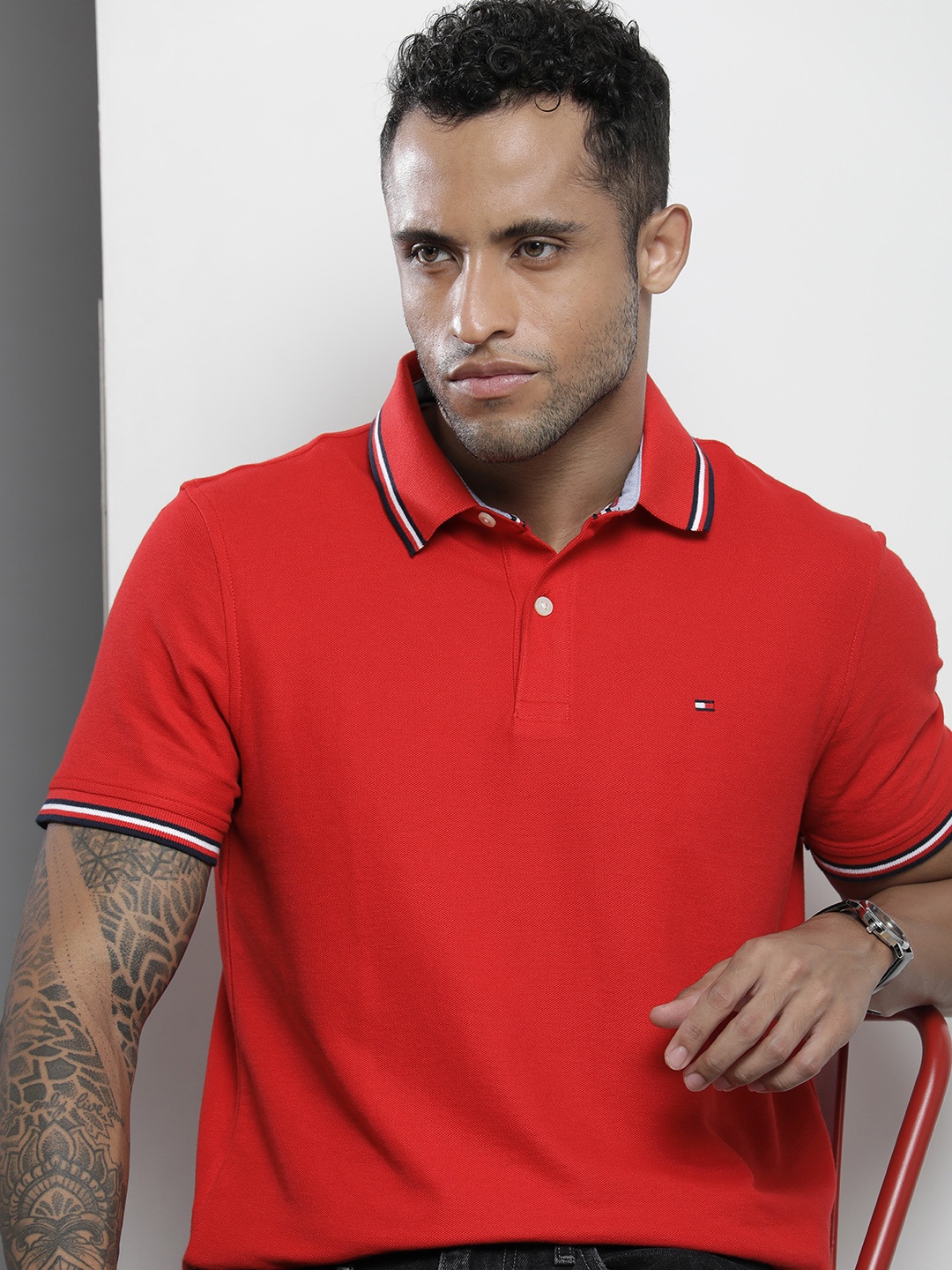 

Tommy Hilfiger Men Red Solid Polo Collar T-shirt