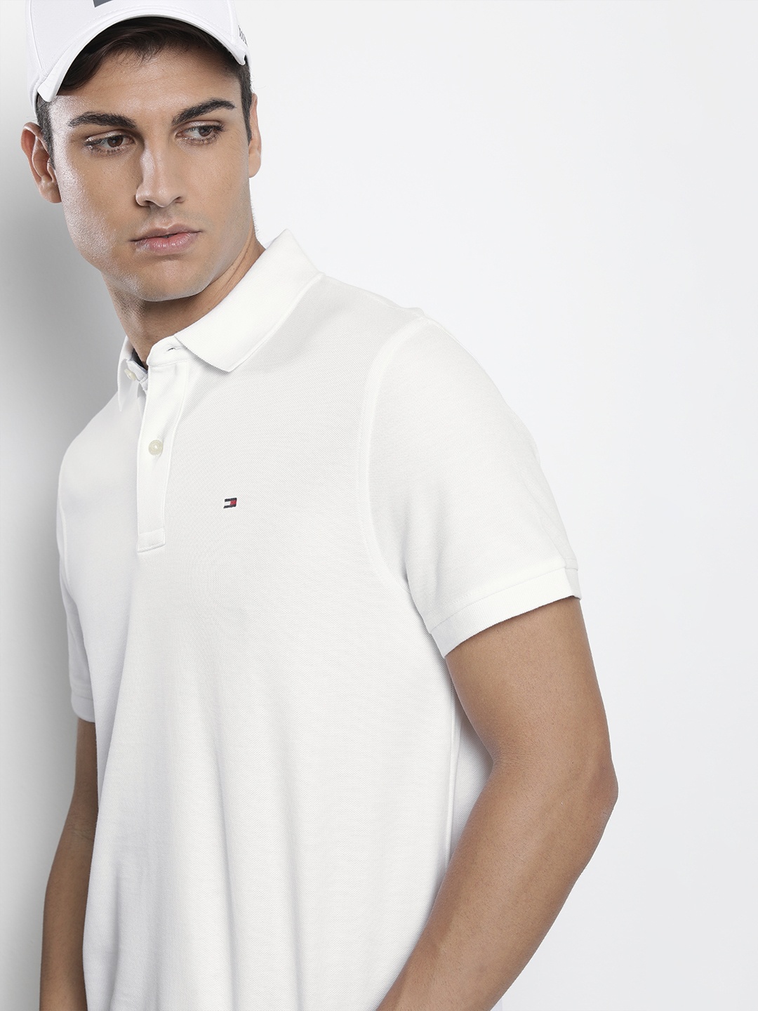 

Tommy Hilfiger Men White Solid Polo Collar Casual T-shirt