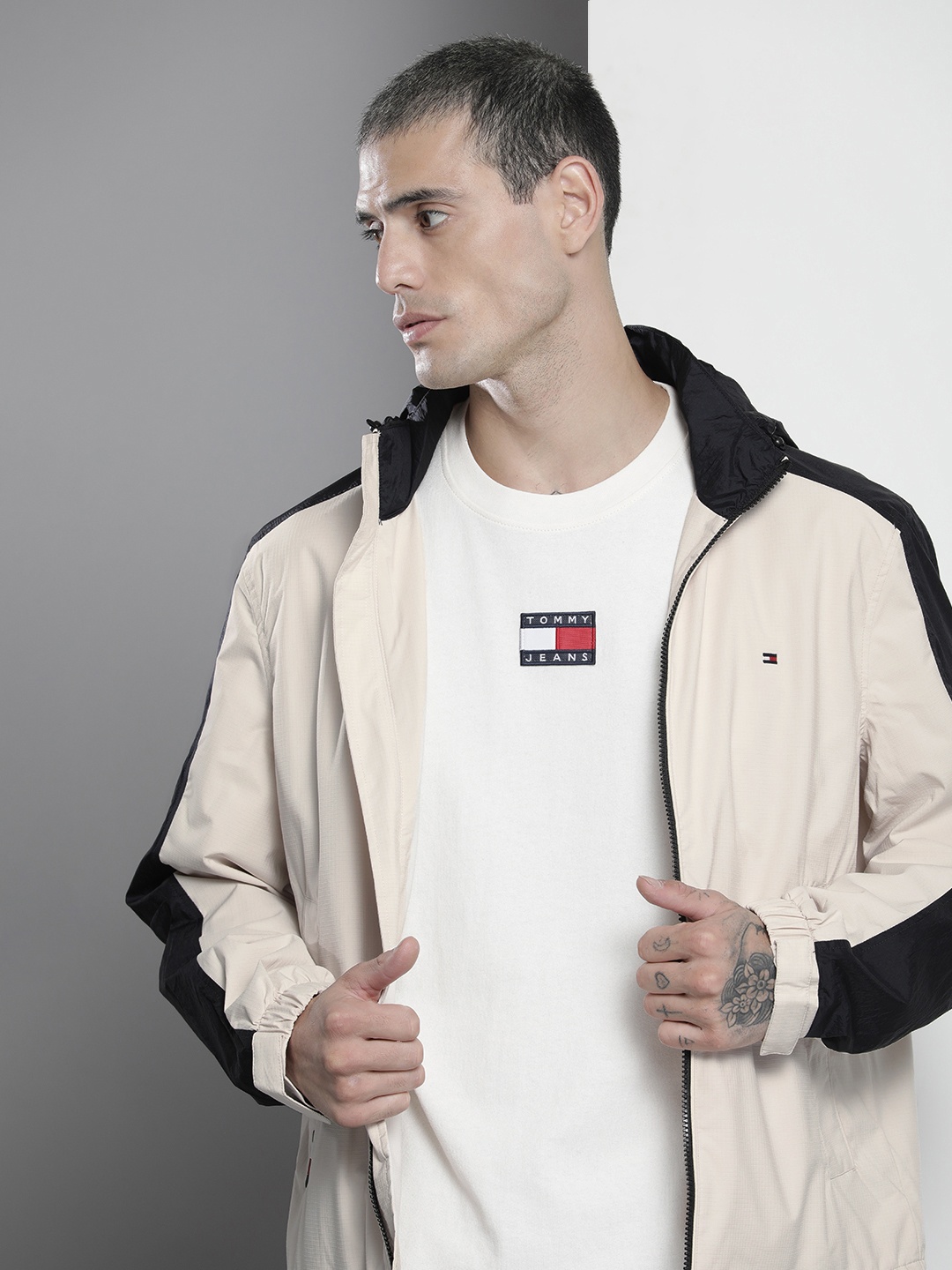 

Tommy Hilfiger Men Beige And Black Colourblocked Bomber Jacket With Detachable Hood