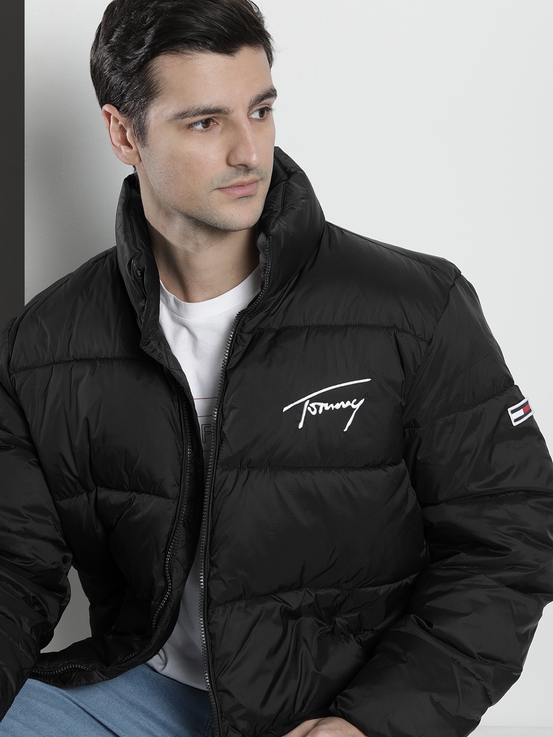 

Tommy Hilfiger Men Black Solid Puffer Jacket with Embroidered Detail