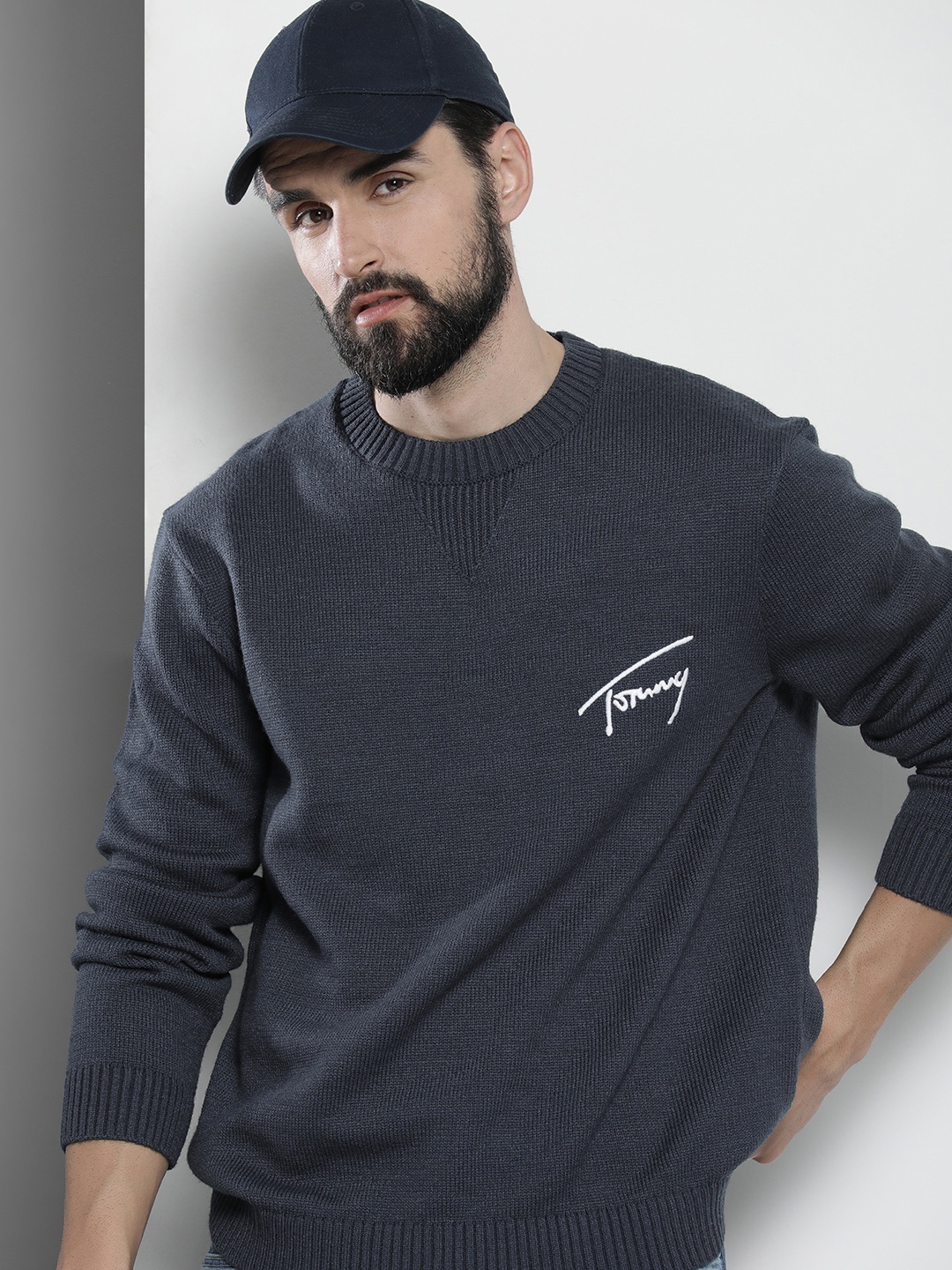 

Tommy Hilfiger Men Navy Blue Solid Casual Signature Sweater