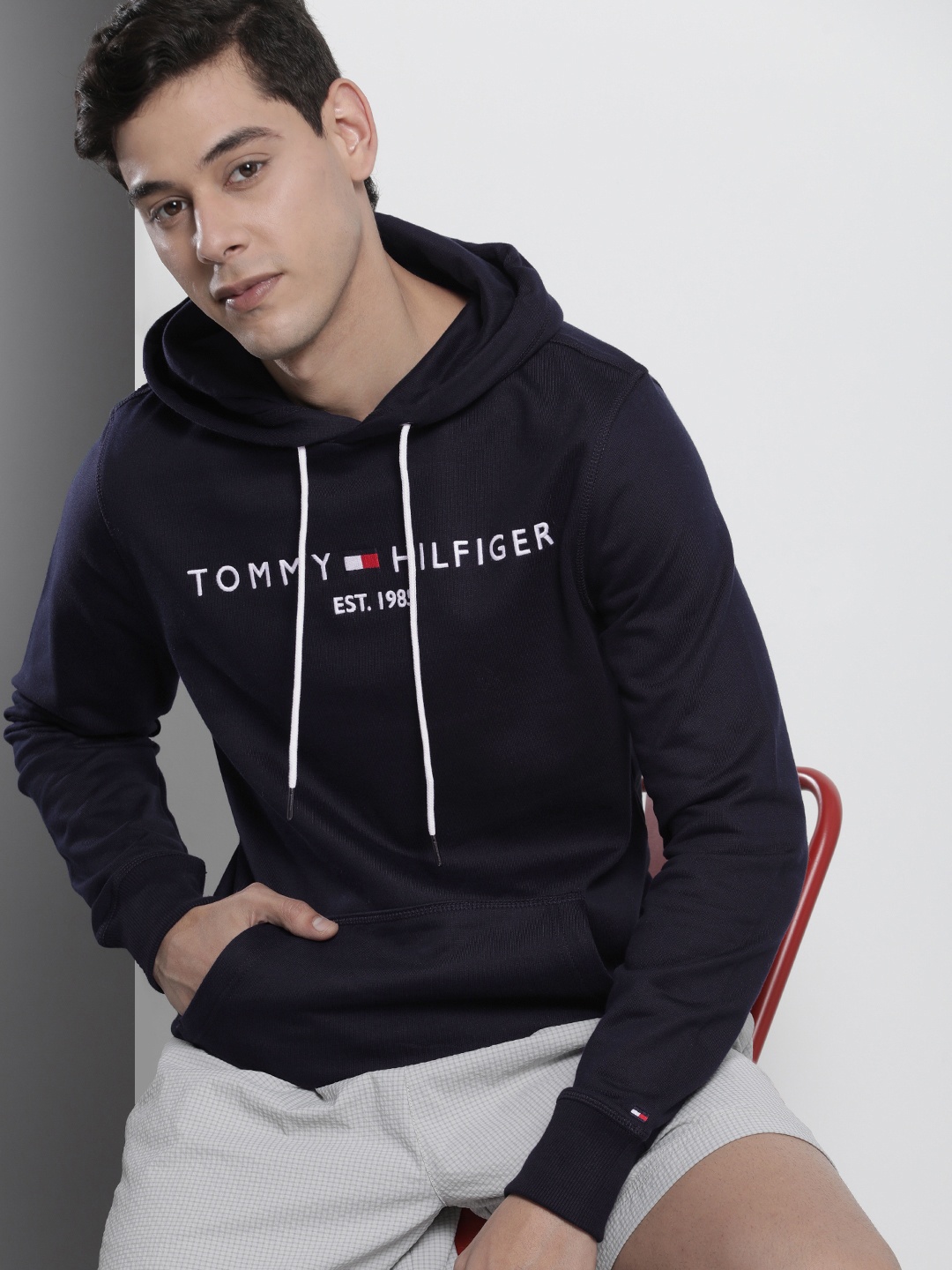

Tommy Hilfiger Men Navy Blue Logo Embroidered Hooded Sweatshirt