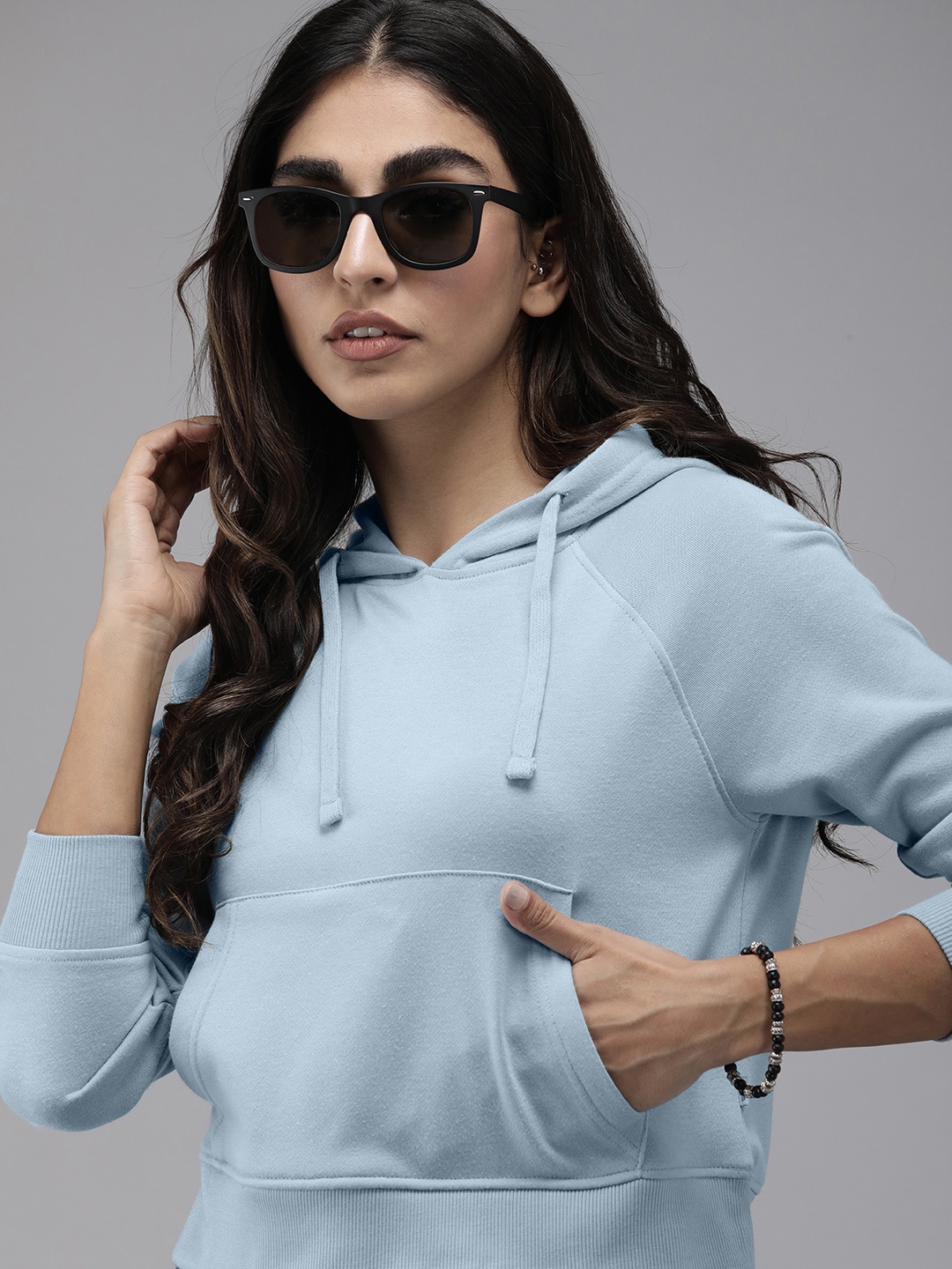 

The Roadster Lifestyle Co. Women Solid Hooded Crop Sweatshirt, Blue