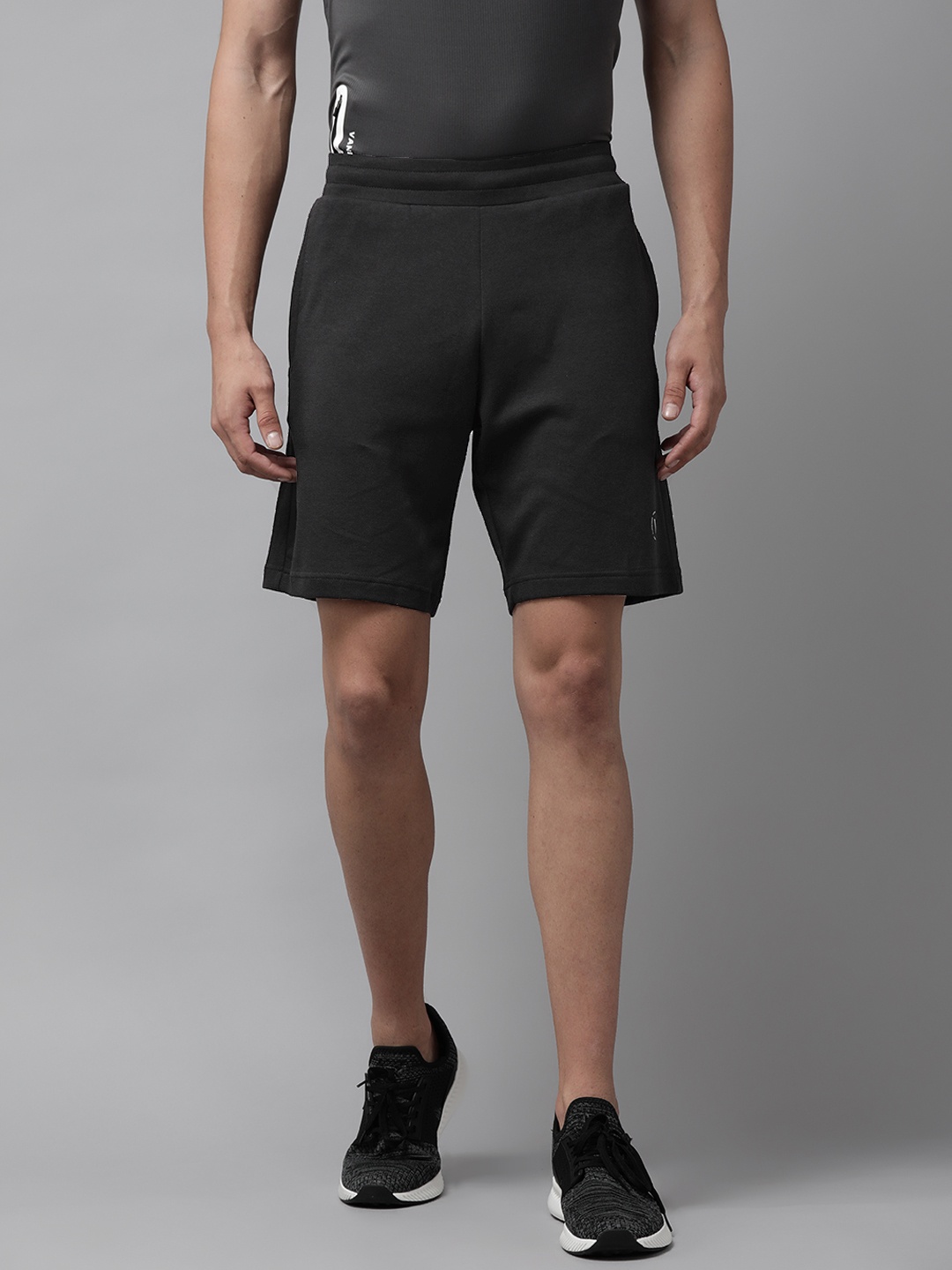 

Van Heusen Men Black Solid Sports Shorts