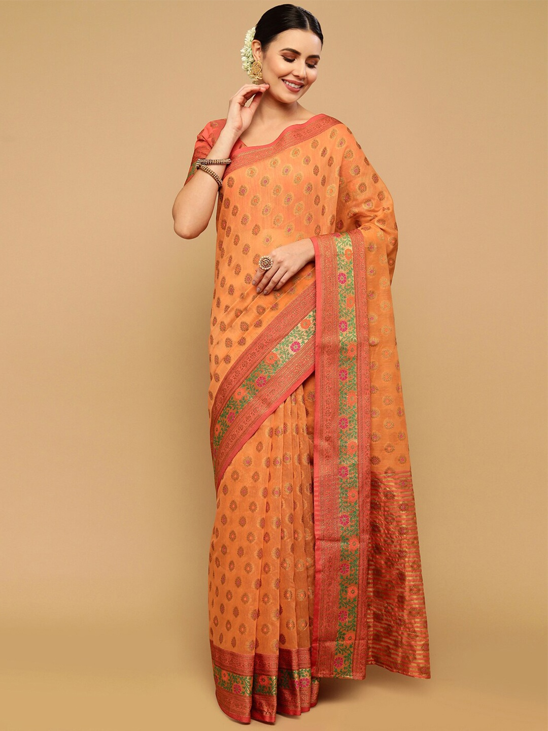 

Satrani Women Peach Floral Print Zari Border Polycotton Jacquard Banarasi Saree