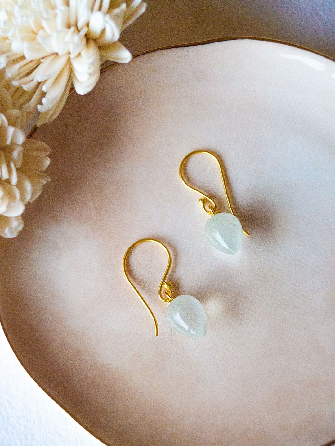 

MANNASH Gold-Toned & White Teardrop Shaped Drop Earrings