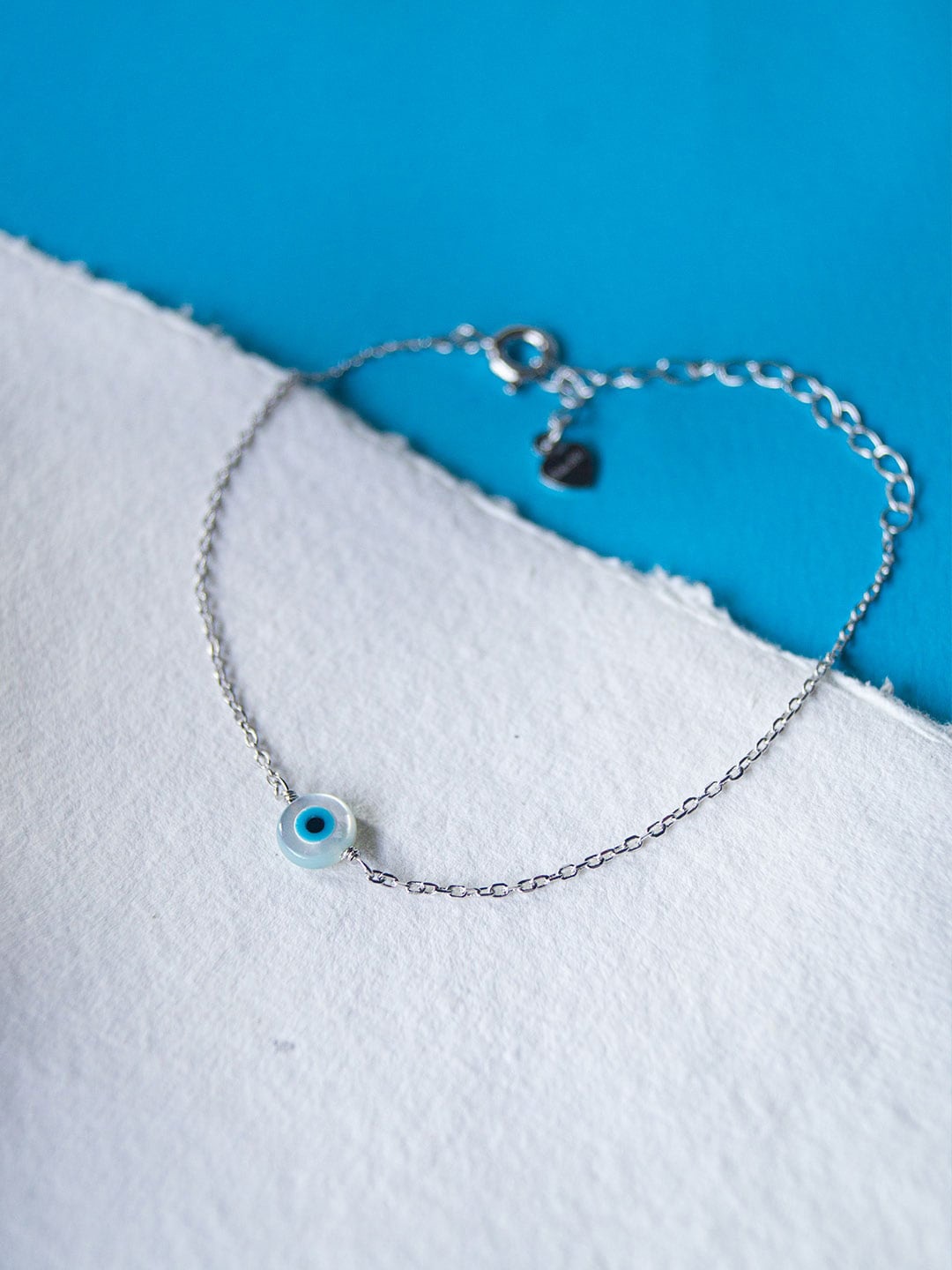 

MANNASH Women Silver-Toned & Blue Sterling Evil Eye Mother of Pearl Bracelet