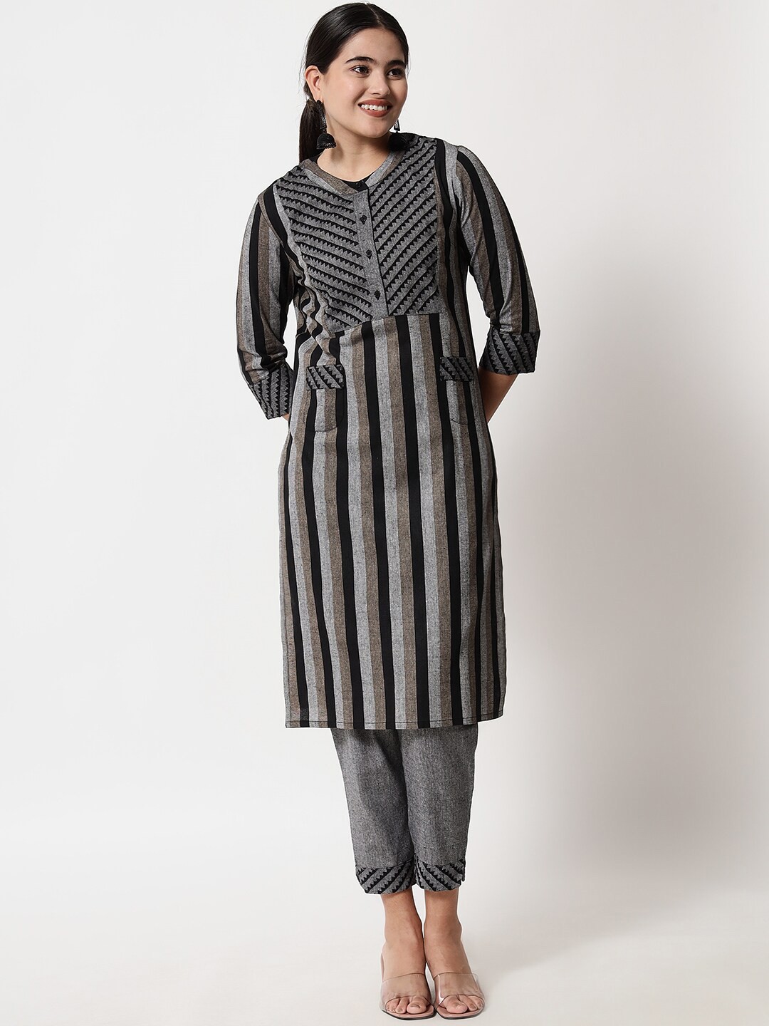 

Yaadleen Women Black Striped Pure Cotton Kurti with Trousers