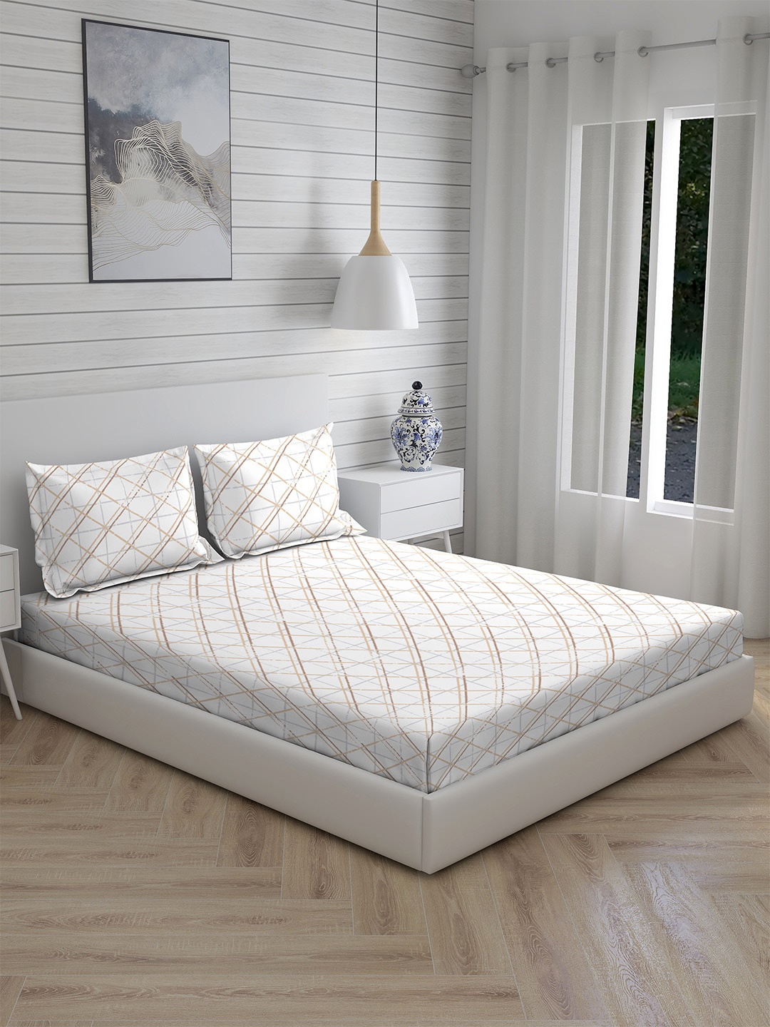 

Layers Brown & White Geometric 144 TC King Bedsheet with 2 Pillow Covers