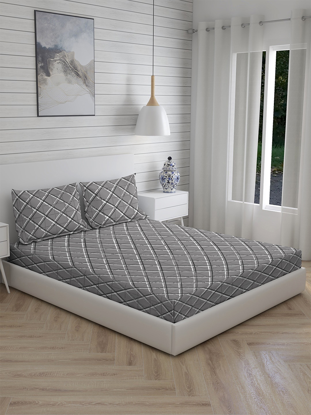 

Layers Grey & White Geometric 144 TC King Bedsheet with 2 Pillow Covers