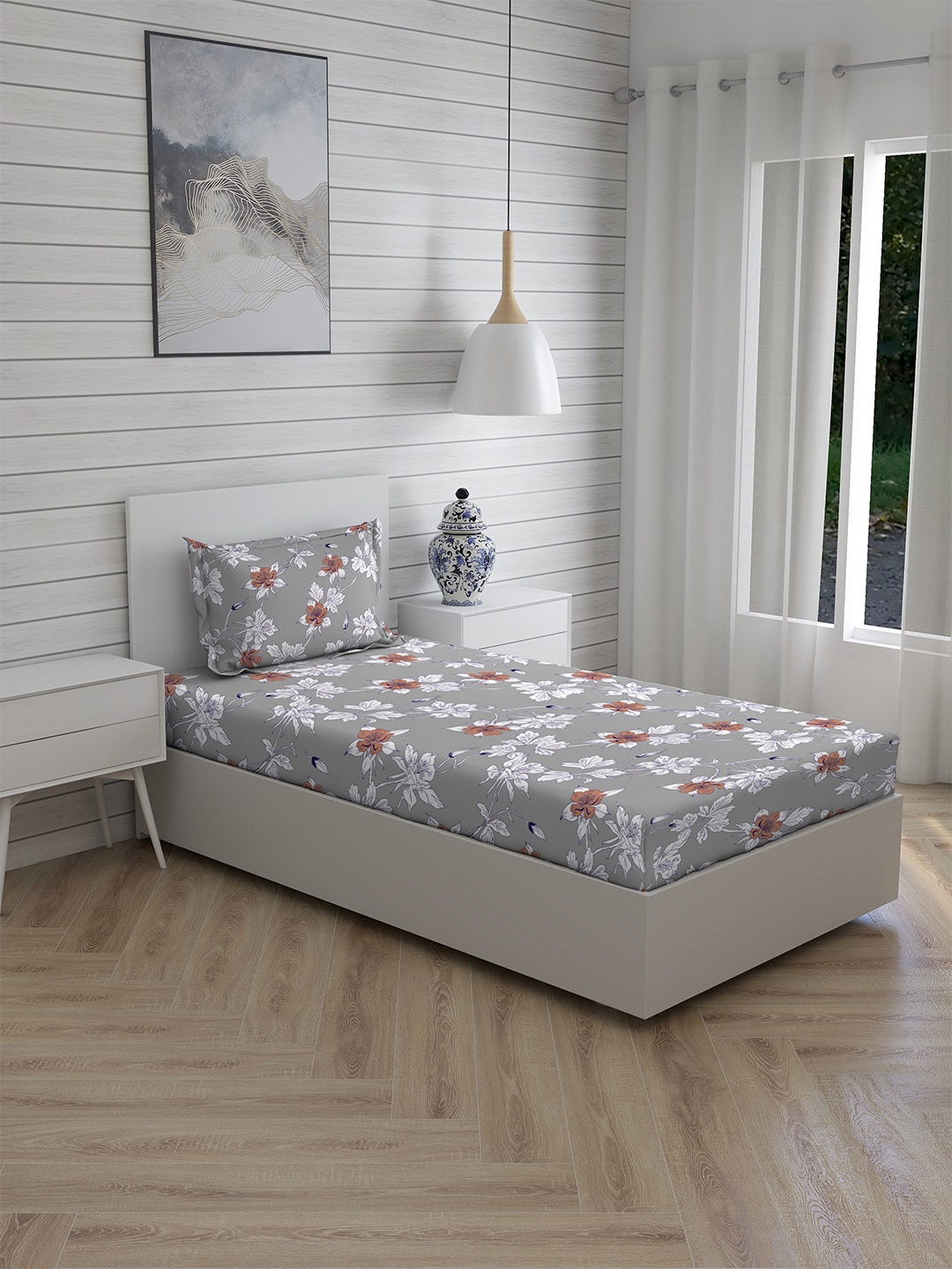 

Layers Grey & White Floral 144 TC Single Bedsheet with 1 Pillow Covers