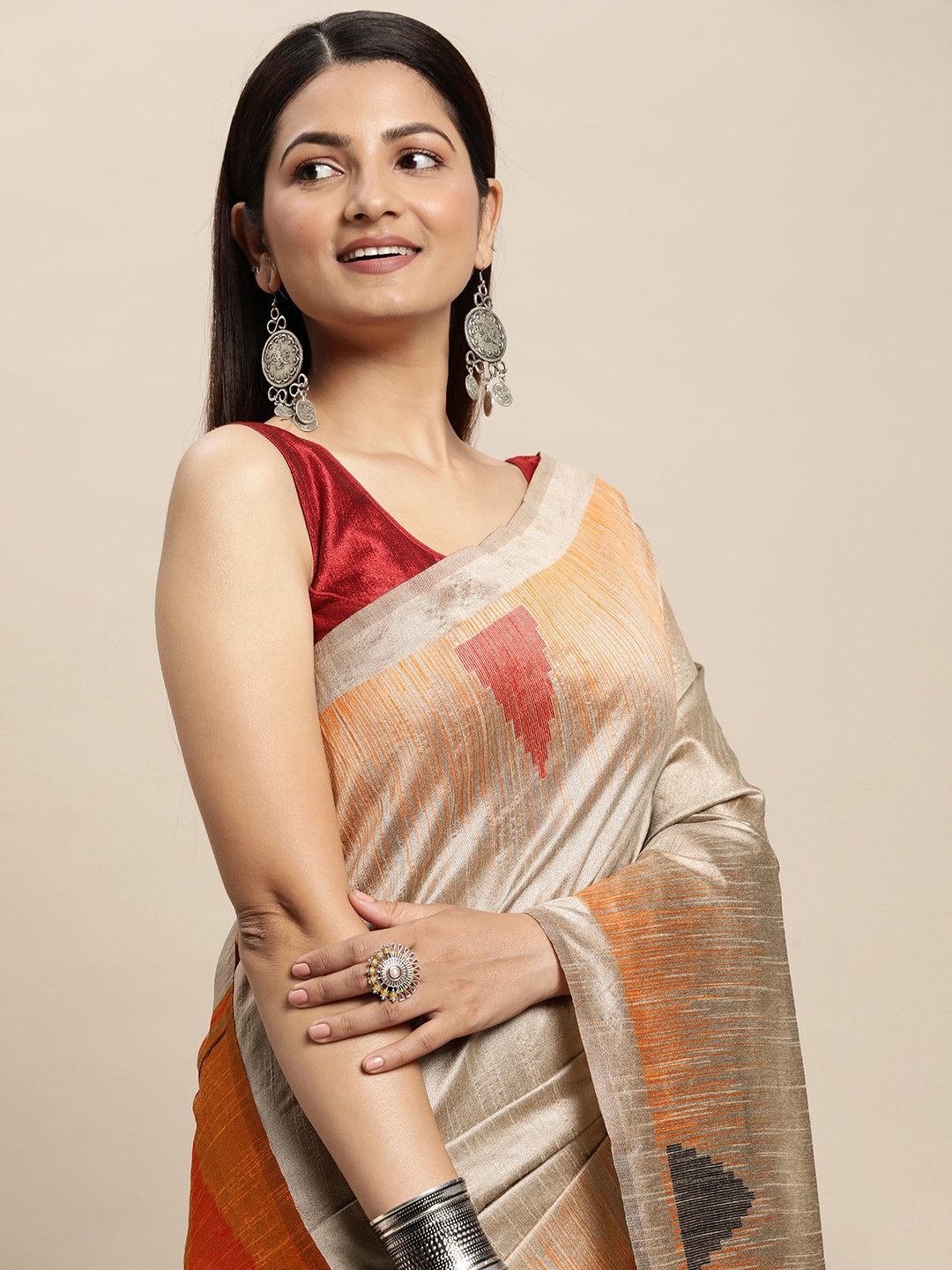 

AYKA CLOTHINGS Tan & Coral Embellished Jacquard Khadi Cotton Ikat Saree