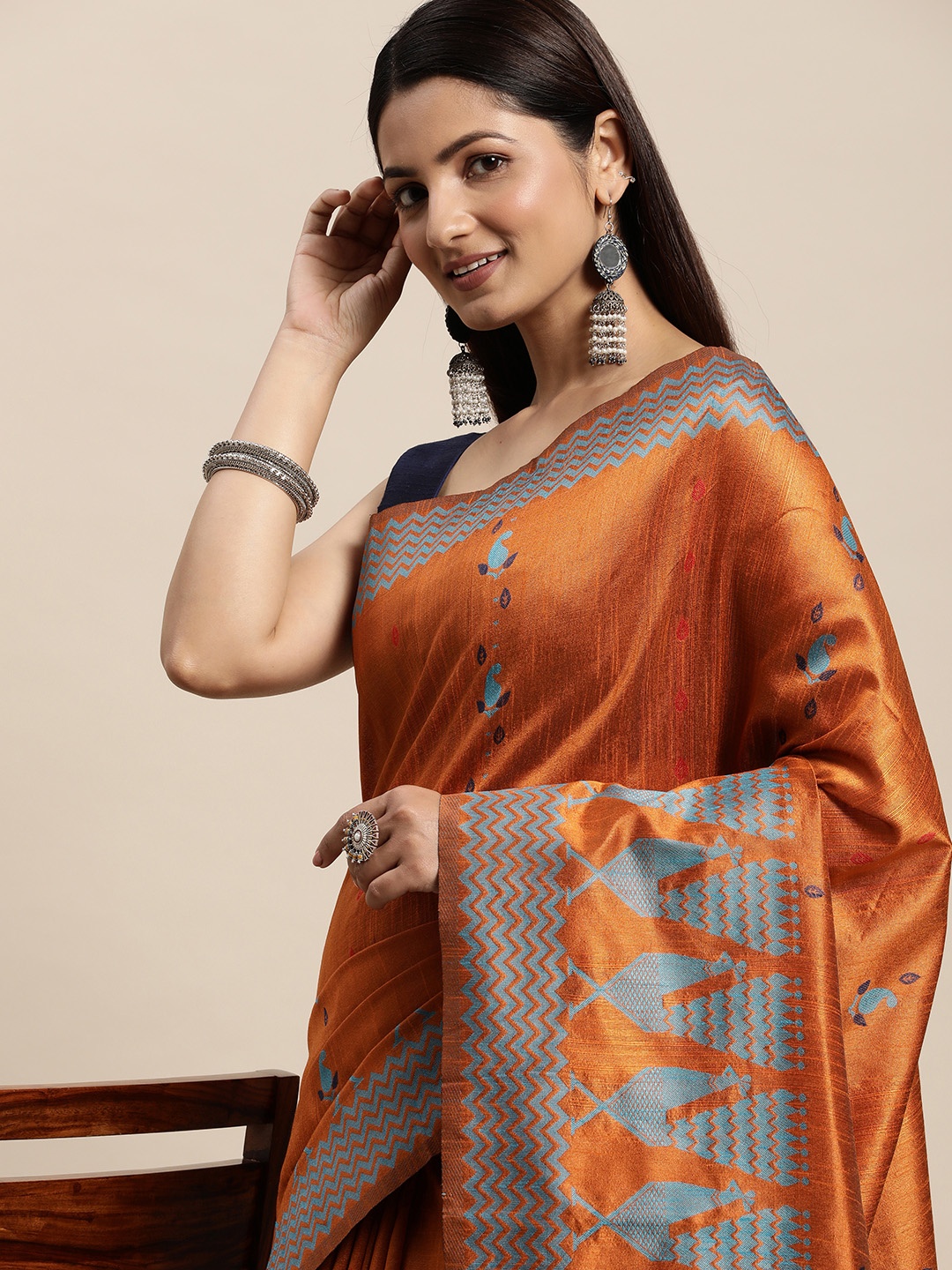 

AYKA CLOTHINGS Rust Orange & Blue Woven Design Ikat Saree